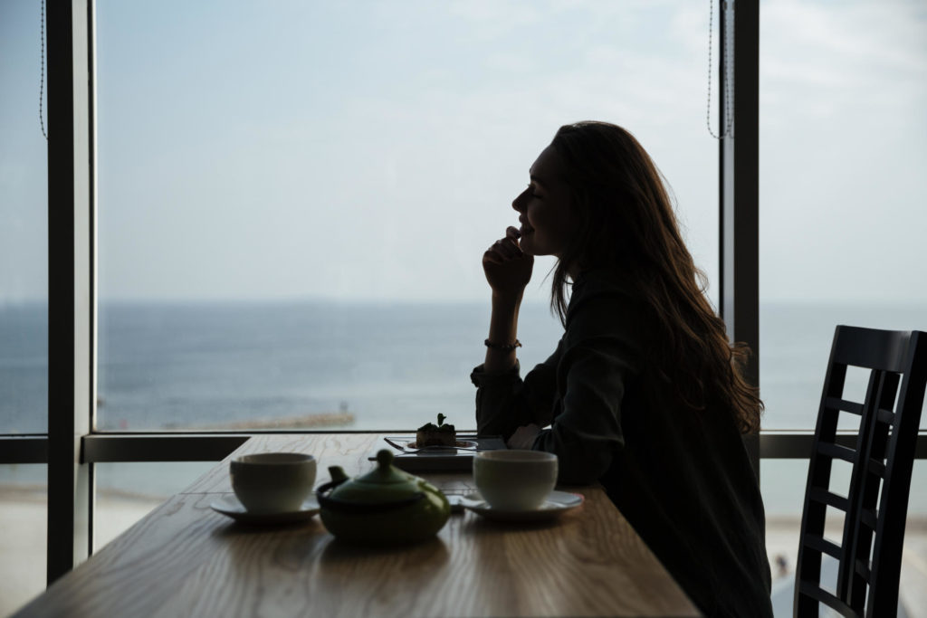 Woman enjoying a quiet meal